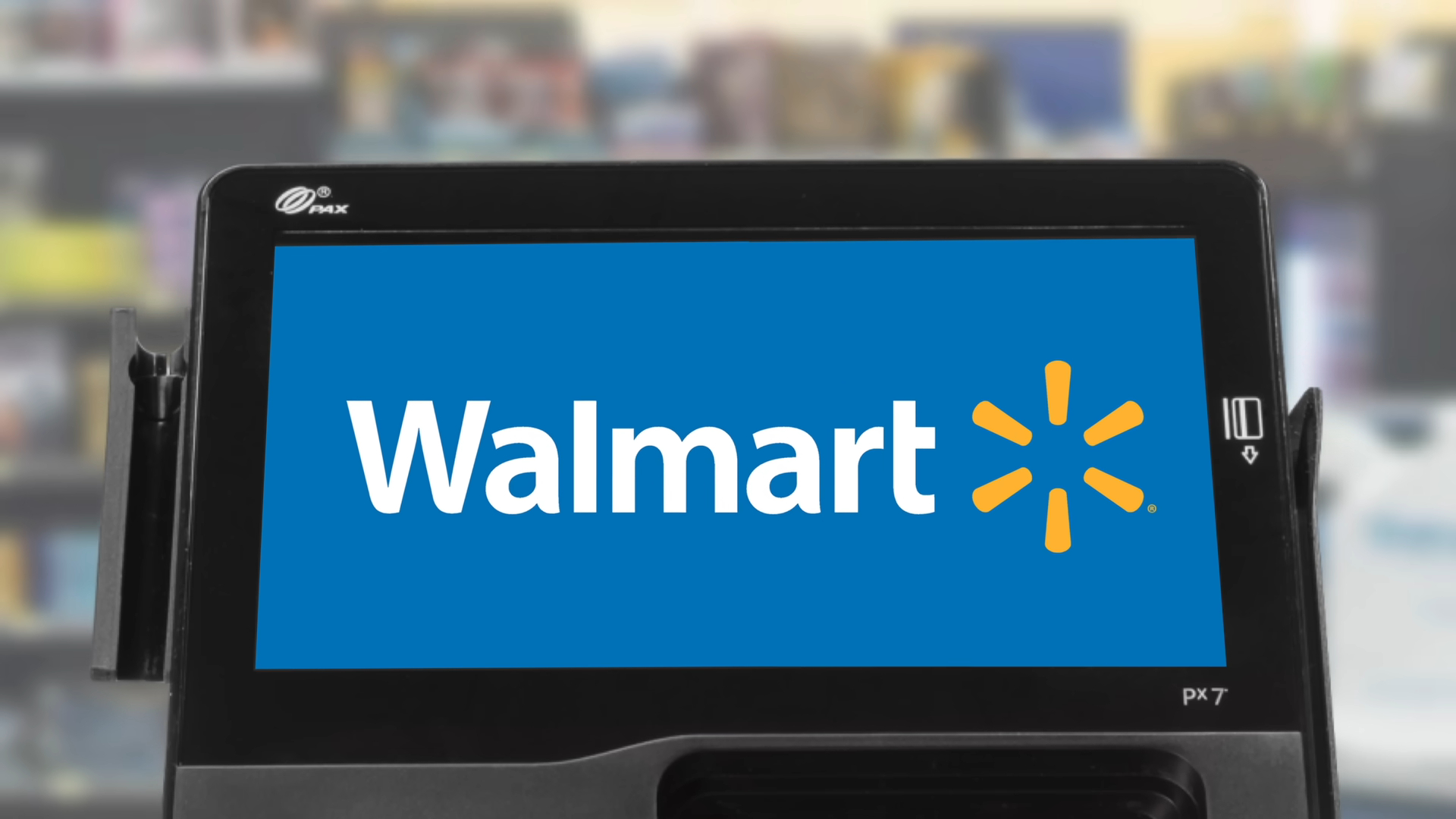 Close-up of a Walmart payment terminal screen showing the Walmart logo, with a blurred store background, indicating a checkout process